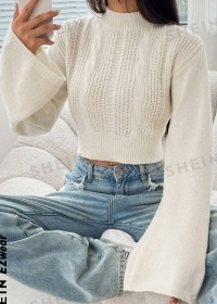 Shop Stylish Long Sweaters With a Flared Sleeve Detail - Image 2